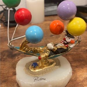 Colorful Clown Figurine with Balloons